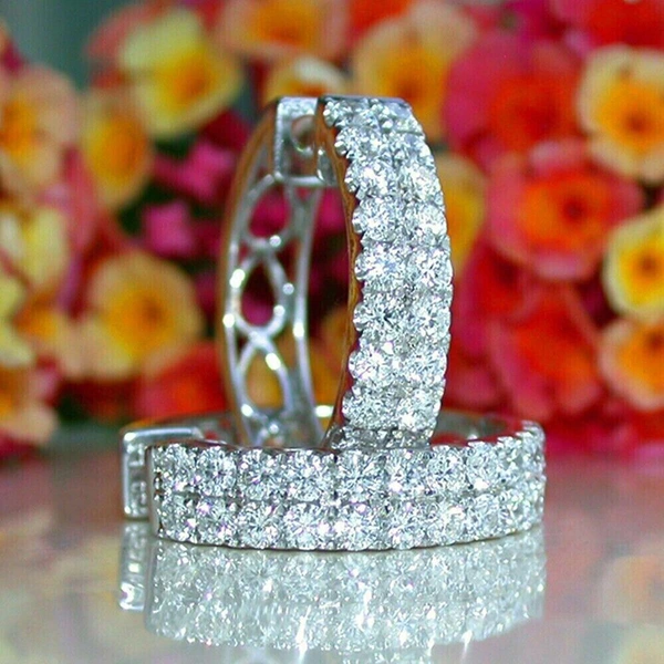 Factory direct sales of fashionable earrings for women with micro-inlaid zircon hollow design, chic and fashionable niche style