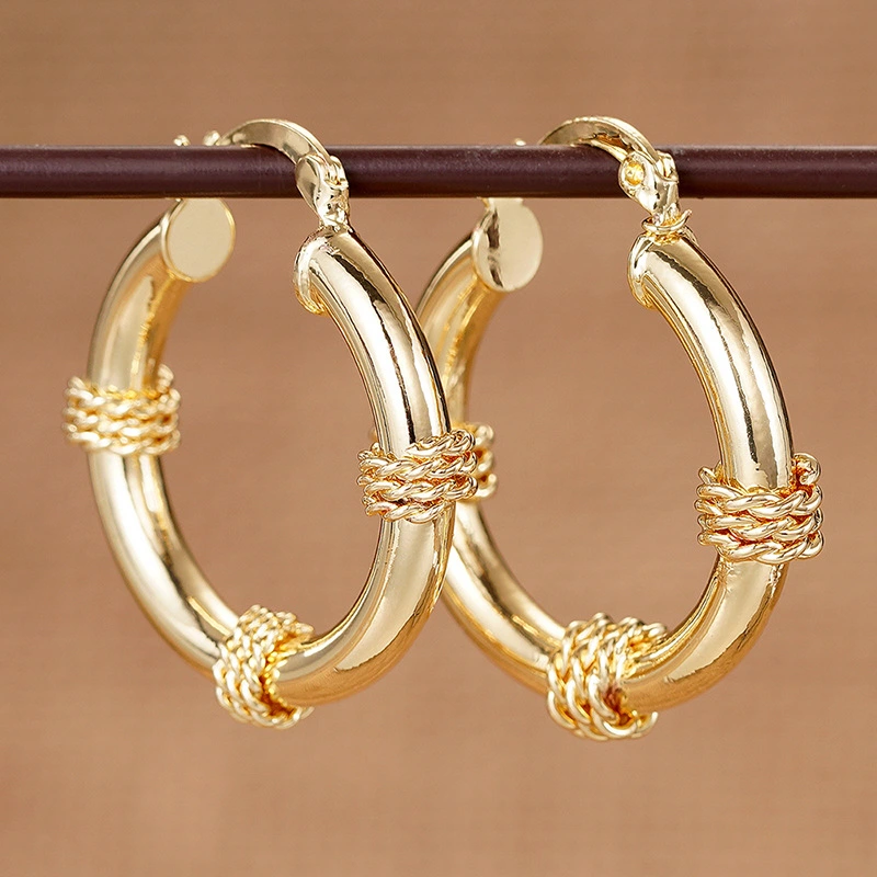 Manufacturers wholesale new Maillard style earrings metal braided creative accessories niche magazine style jewelry