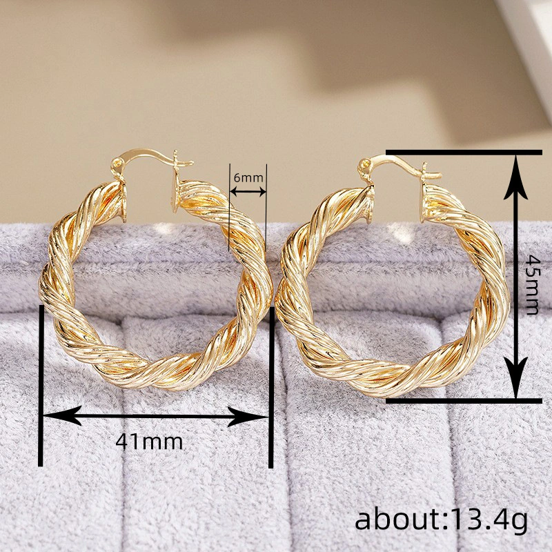 Middle Eastern European and American earrings for women with twisted spiral design, high-end style, super popular