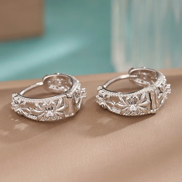 Korean style gentle style earrings for women metal hollow flower Chrome Heart accessories French hot selling jewelry