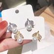 New imitation pearl leaf earrings for women, daily wear, ladies' accessories, fashionable, elegant and light luxury style