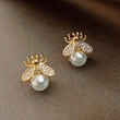Simple and compact Korean earrings for women, niche design, bee imitation pearl earrings, 2022 spring new style