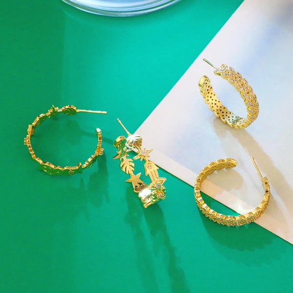 Clearance European and American creative micro-inlaid zircon C-shaped earrings eyes smile palm leaves splicing geometric earrings erx09