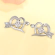  Cupid heart design earrings for women, fashionable and individual hot girl earrings, European and Korean trendy earrings