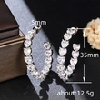  2024 hot-selling heavy-duty full-inlaid earrings, luxurious C-shaped temperament heart earrings, European and American fashion earrings