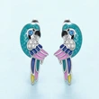 Hot selling ear clips from European and American manufacturers, oil dripping parrot bird jewelry, cute simulated animal zircon style