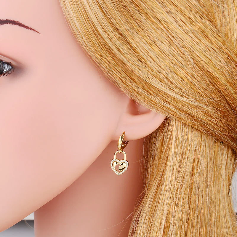 Clearance Korean version of the personalized earrings love lock earrings hollow cross butterfly star moon diamond earrings female erx07