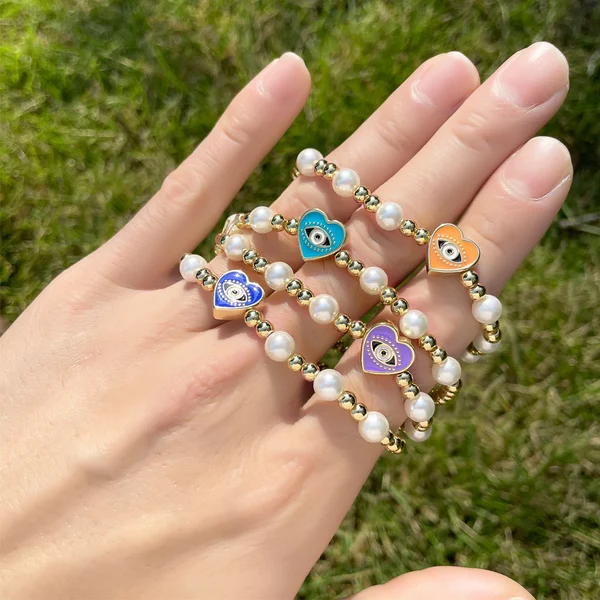 Clearance sale heart-shaped devil's eye bracelet European and American celebrity pearl gold beaded elastic bracelet bre80