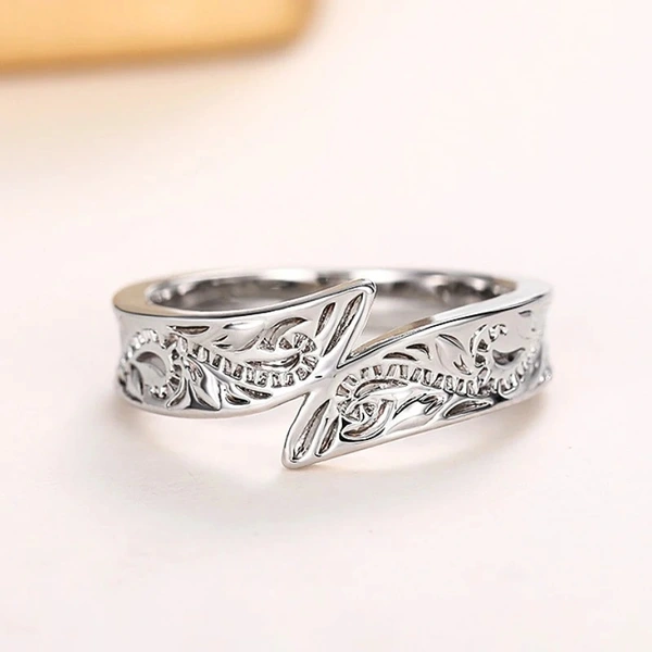  European and American metallic feather ring hip-hop trend single ring personality retro swing arm men and women ring