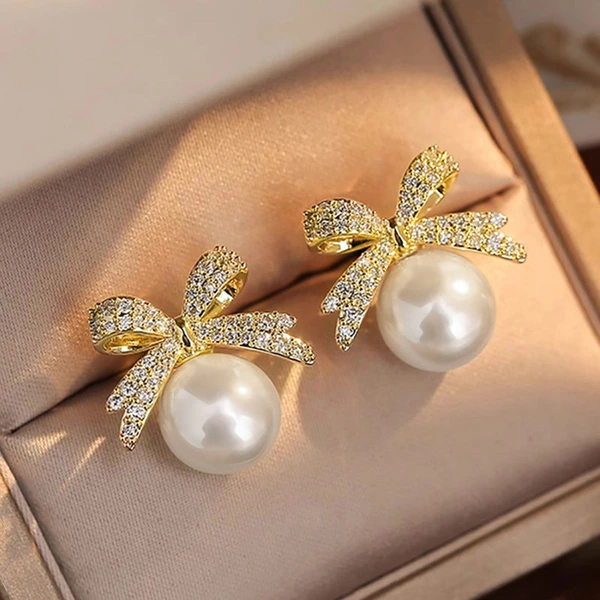  Japanese and Korean bow earrings for women, elegant and sweet accessories, imitation pearl design, hot sale