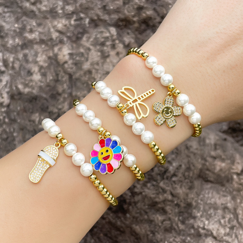 Clearance European and American new jewelry color sunflower sunflower smiley face pearl bracelet beaded bracelet female brd82