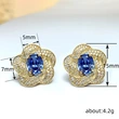  European and American imitation Tanzanite blue earrings egg-shaped temperament celebrity round face flower earrings retro style earrings