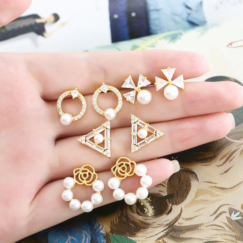 European and American hot-selling flower pearl earrings copper plated 18k gold style temperament triangle earrings eru89