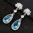 Internet celebrity live broadcast new long water drop pear-shaped flower earrings simulated yellow diamond topaz pink diamond earrings