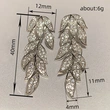 Micro-inlaid zircon shiny leaf earrings for women, exquisite temperament plant long earrings, popular in Europe and America