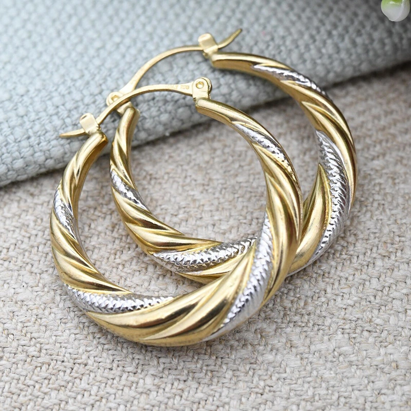 Hot selling European and American metal earrings for women, two-color circle design jewelry, twisted exaggerated personality jewelry