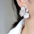 Glossy luxury floral earrings for women with micro-diamond lily flower jewelry, exaggerated dress fashionable accessories