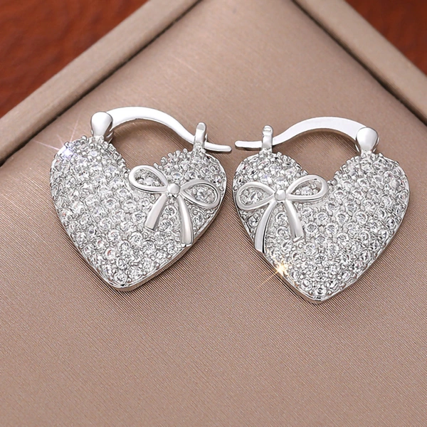   Hot selling earrings with full inlay, fashionable and elegant bow heart earrings, light luxury women's earrings