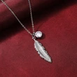 New Bohemian retro feather pendant necklace female creative tassel personality sweater chain