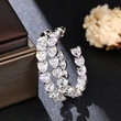  2024 hot-selling heavy-duty full-inlaid earrings, luxurious C-shaped temperament heart earrings, European and American fashion earrings