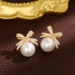 Bowknot diamond imitation pearl female earrings French retro exquisite earrings Japanese and Korean light luxury earrings