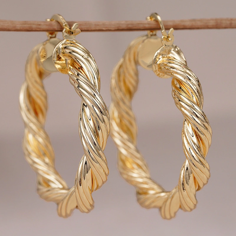 Middle Eastern European and American earrings for women with twisted spiral design, high-end style, super popular