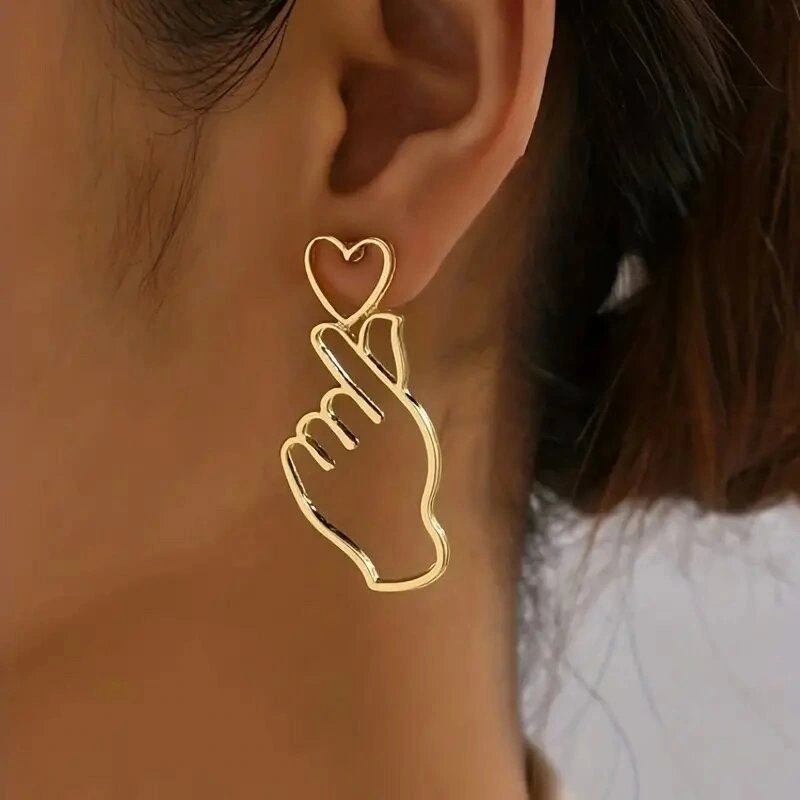 Simple hollow heart earrings for women, personalized European and American exaggerated metal earrings, gesture temperament earrings