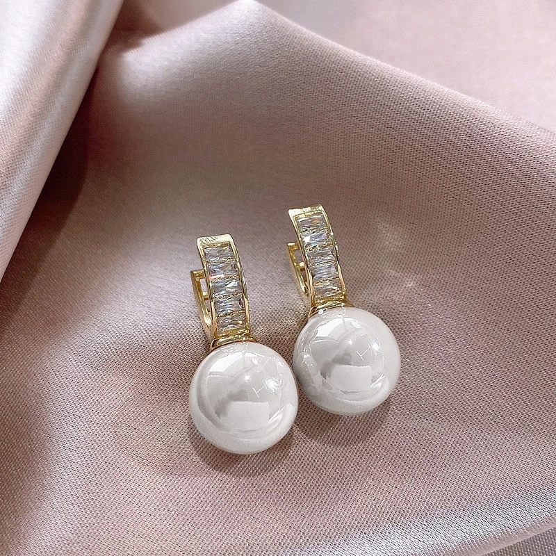 TEMU's new hot-selling earrings, pink pearl earrings for women, niche design ear clips, light luxury French earrings