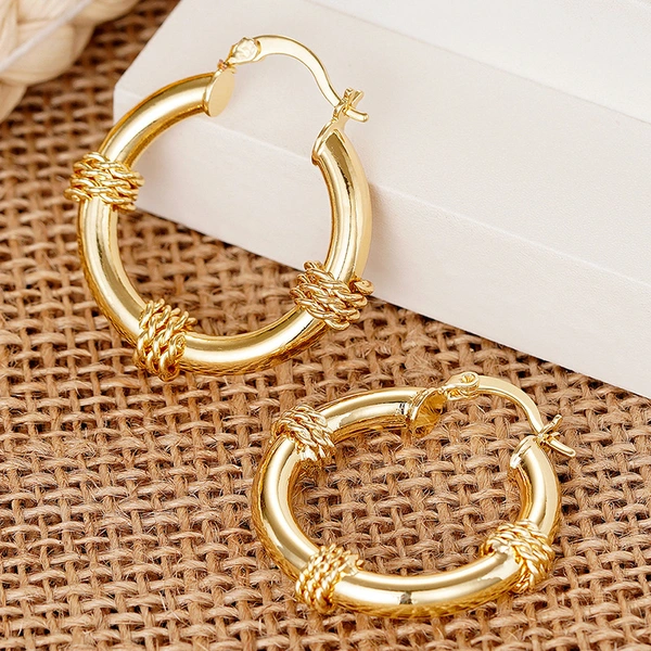 Manufacturers wholesale new Maillard style earrings metal braided creative accessories niche magazine style jewelry