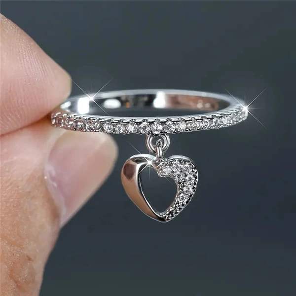   Niche simple all-match ring love heart-shaped hollow index finger ring design pendant female ring
