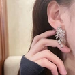 European and American luxury super flash earrings leaf temperament design earrings long wisteria flower exquisite earrings for women