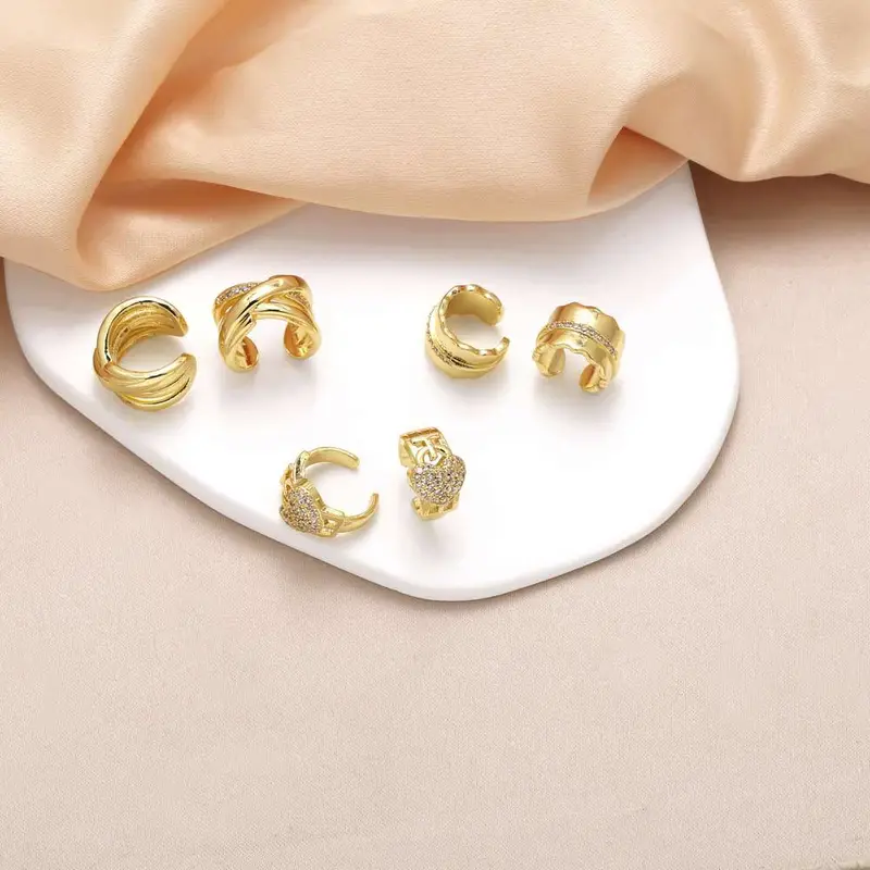 AS jewelry love full zircon earrings female European and American copper plated real gold cross bone clip earrings era250