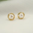  Korean version of simple niche imitation pearl earrings twisted flower flower earrings retro Hong Kong style French earrings