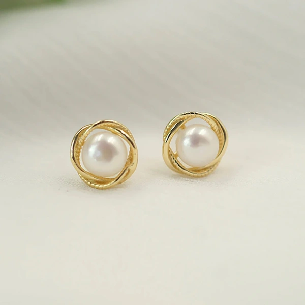  Korean version of simple niche imitation pearl earrings twisted flower flower earrings retro Hong Kong style French earrings