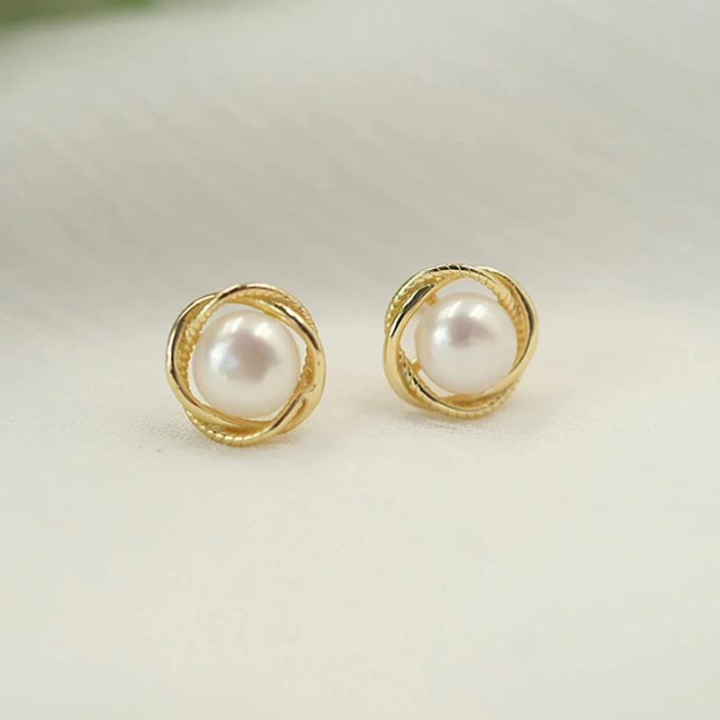  Korean version of simple niche imitation pearl earrings twisted flower flower earrings retro Hong Kong style French earrings
