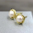  Korean version of simple niche imitation pearl earrings twisted flower flower earrings retro Hong Kong style French earrings