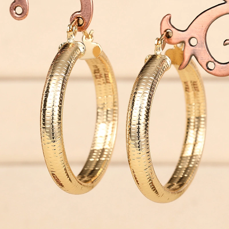 Middle Eastern hot-selling earrings for women with striped metal texture accessories, manufacturers of European and American new styles