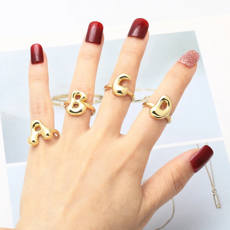 AS jewelry smooth 26 English letters ring female copper plated real gold open ring rih04