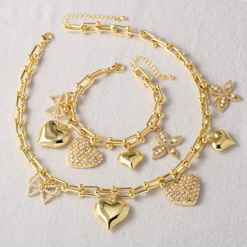 Clearance jewelry Europe and the United States hot selling love pearl butterfly pendant gold-plated necklace bracelet set female nka042