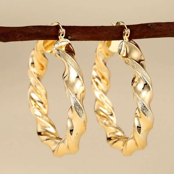 Spiral metal electroplated gold earrings for women, niche design, high-end style earrings, Asian sweet and cool accessories