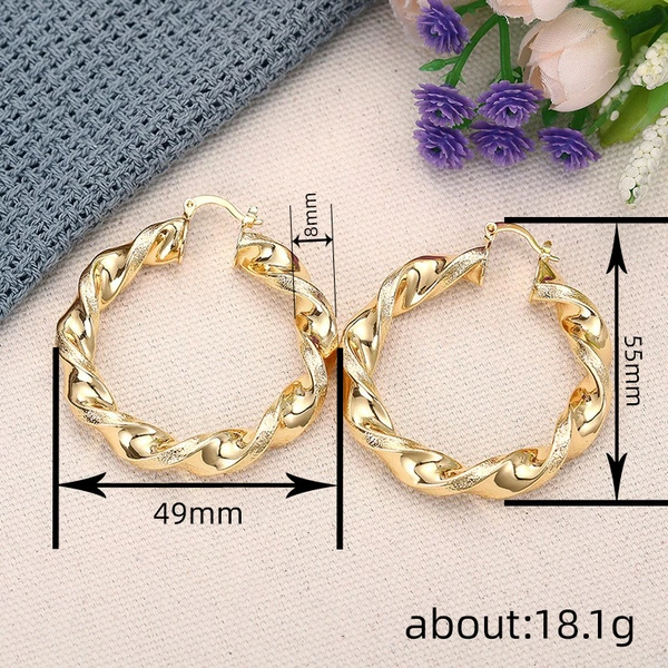 Spiral metal electroplated gold earrings for women, niche design, high-end style earrings, Asian sweet and cool accessories