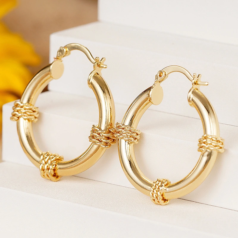 Manufacturers wholesale new Maillard style earrings metal braided creative accessories niche magazine style jewelry