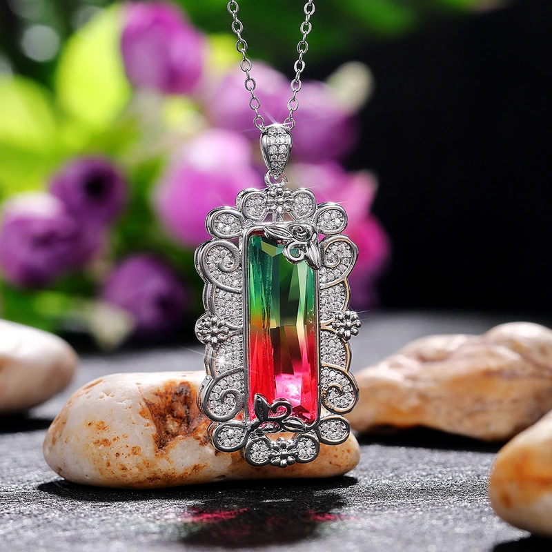 Hot selling European and American synthetic colored gemstone tourmaline pendant hollow pattern inlaid colored zircon necklace for women