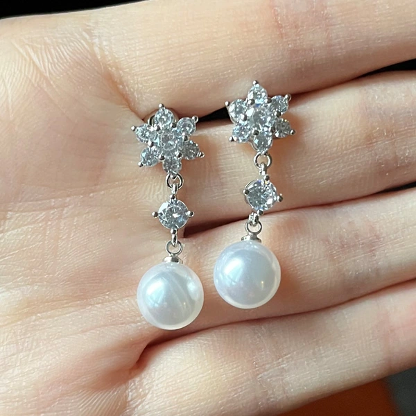 Baroque new imitation pearl earrings snowflake earrings elegant women's copper-plated platinum tassel earrings