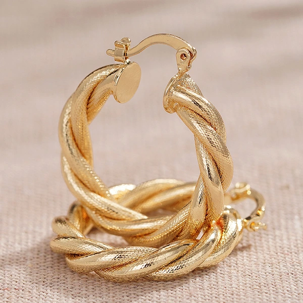 Manufacturers wholesale Middle Eastern Asian hot style twist braided thread design earrings net celebrity style ring heavy industry