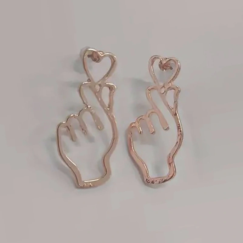 Simple hollow heart earrings for women, personalized European and American exaggerated metal earrings, gesture temperament earrings