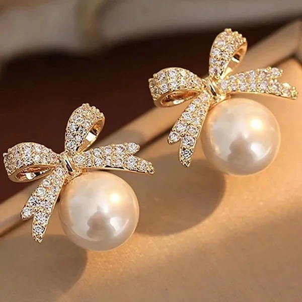 Bowknot diamond imitation pearl female earrings French retro exquisite earrings Japanese and Korean light luxury earrings