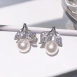 New imitation pearl leaf earrings for women, daily wear, ladies' accessories, fashionable, elegant and light luxury style
