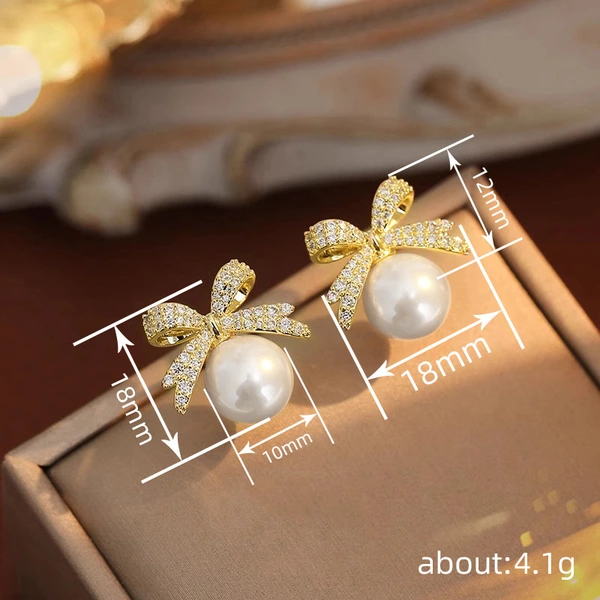 Japanese and Korean bow earrings for women, elegant and sweet accessories, imitation pearl design, hot sale