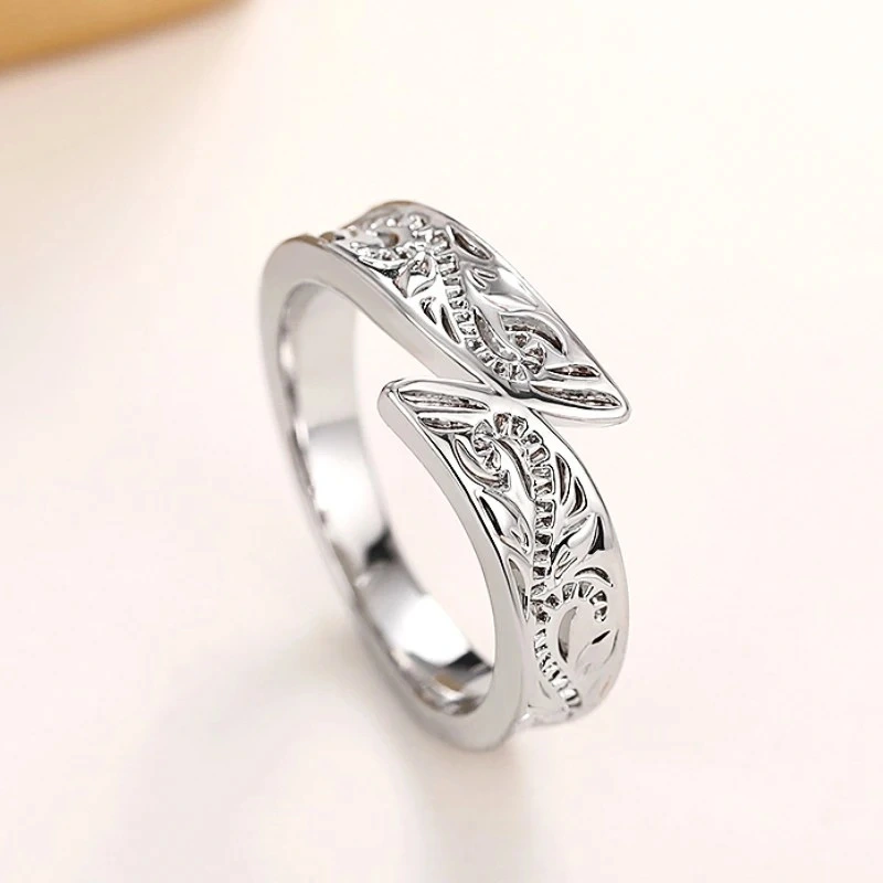  European and American metallic feather ring hip-hop trend single ring personality retro swing arm men and women ring